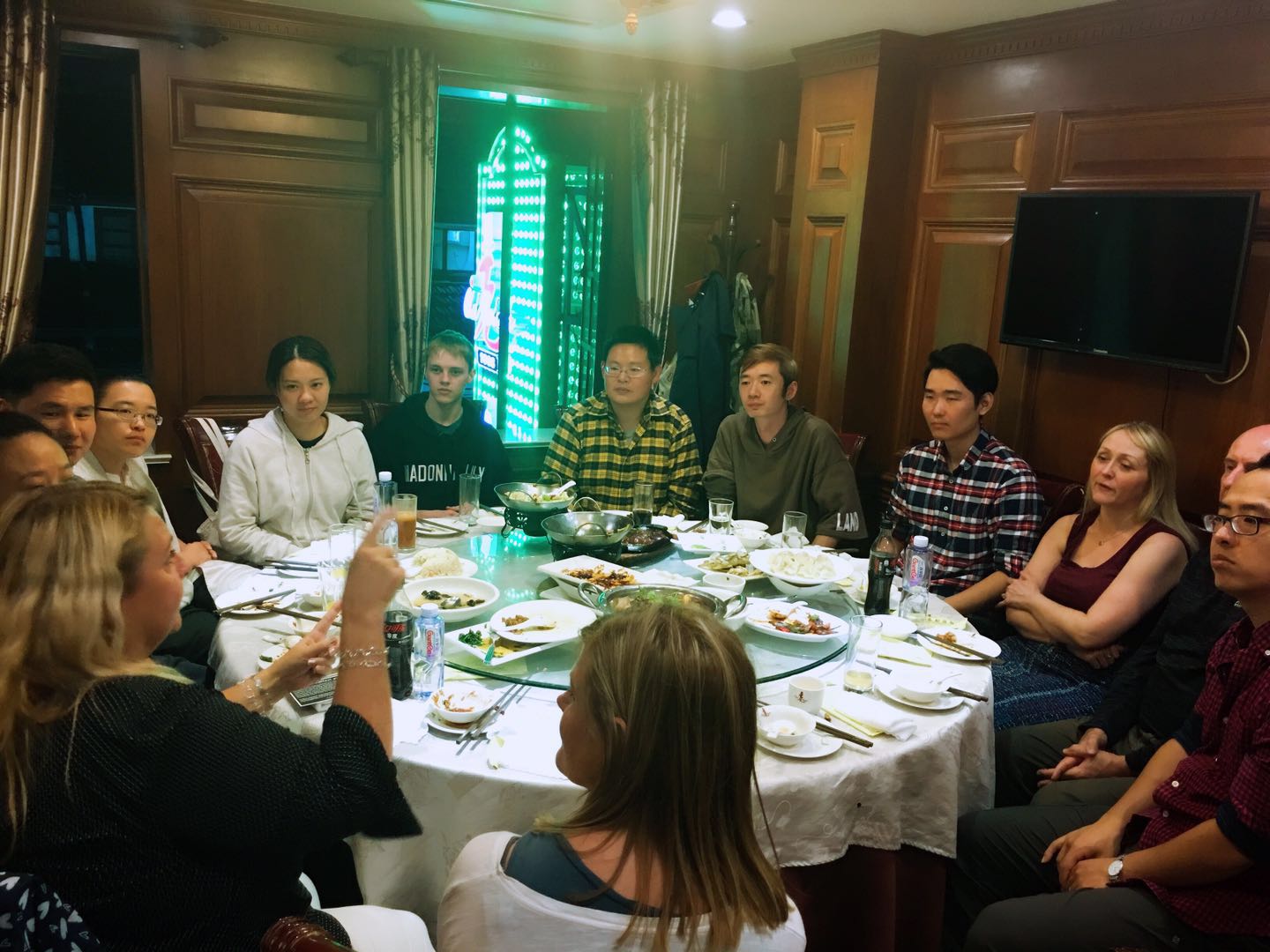 Wed Meal with Shanghai deaf directors explaining about deaffest in international sign