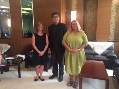 With director of shanghai deaf association as well as deputy director of China deaf association